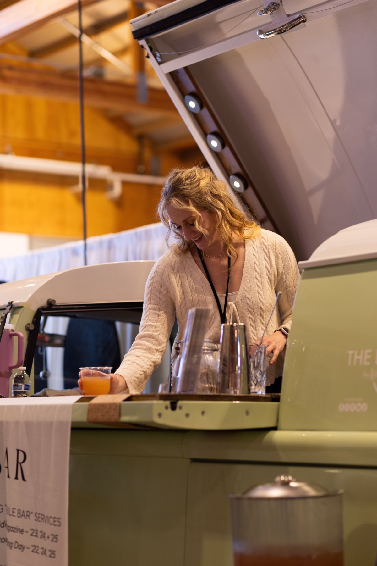mobile bar service salem wedding - Exhibiting Information Professional bartender serving drinks at mobile bar setup at Salem wedding show